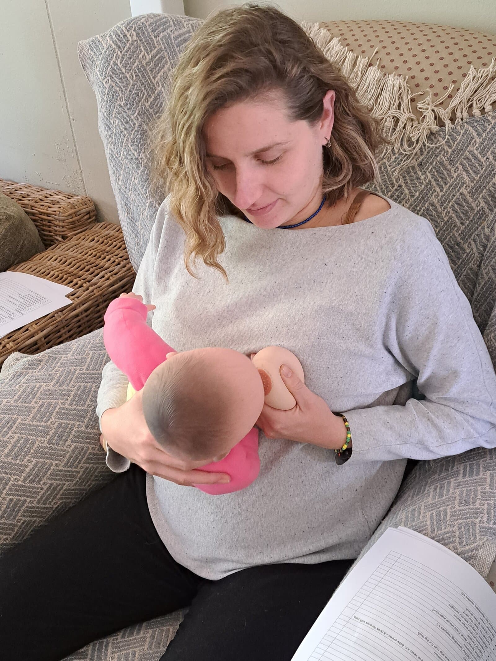 Mum breastfeeding baby during a lactation consultation